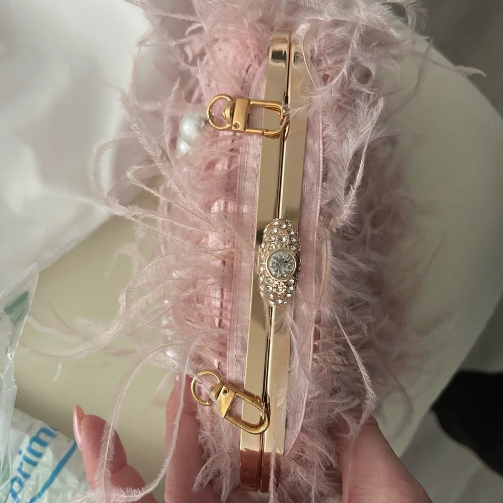 Chic Pink Feathered Handbag with Pearl Handle
